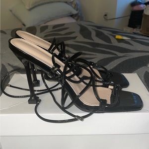 Black shein Strappy faux  patent leather 4 inch heels.